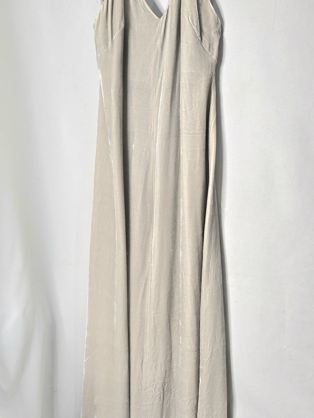 Elegant timeless champagne velvet halter dress with a flowing silhouette